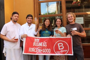 Vivant staff with B Corp sign