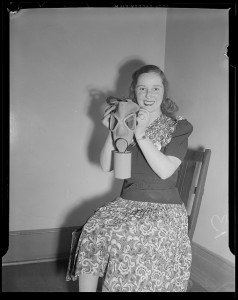 Smiling woman with gas mask